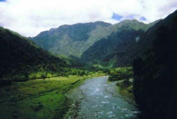 Arahura River with mountain range in background